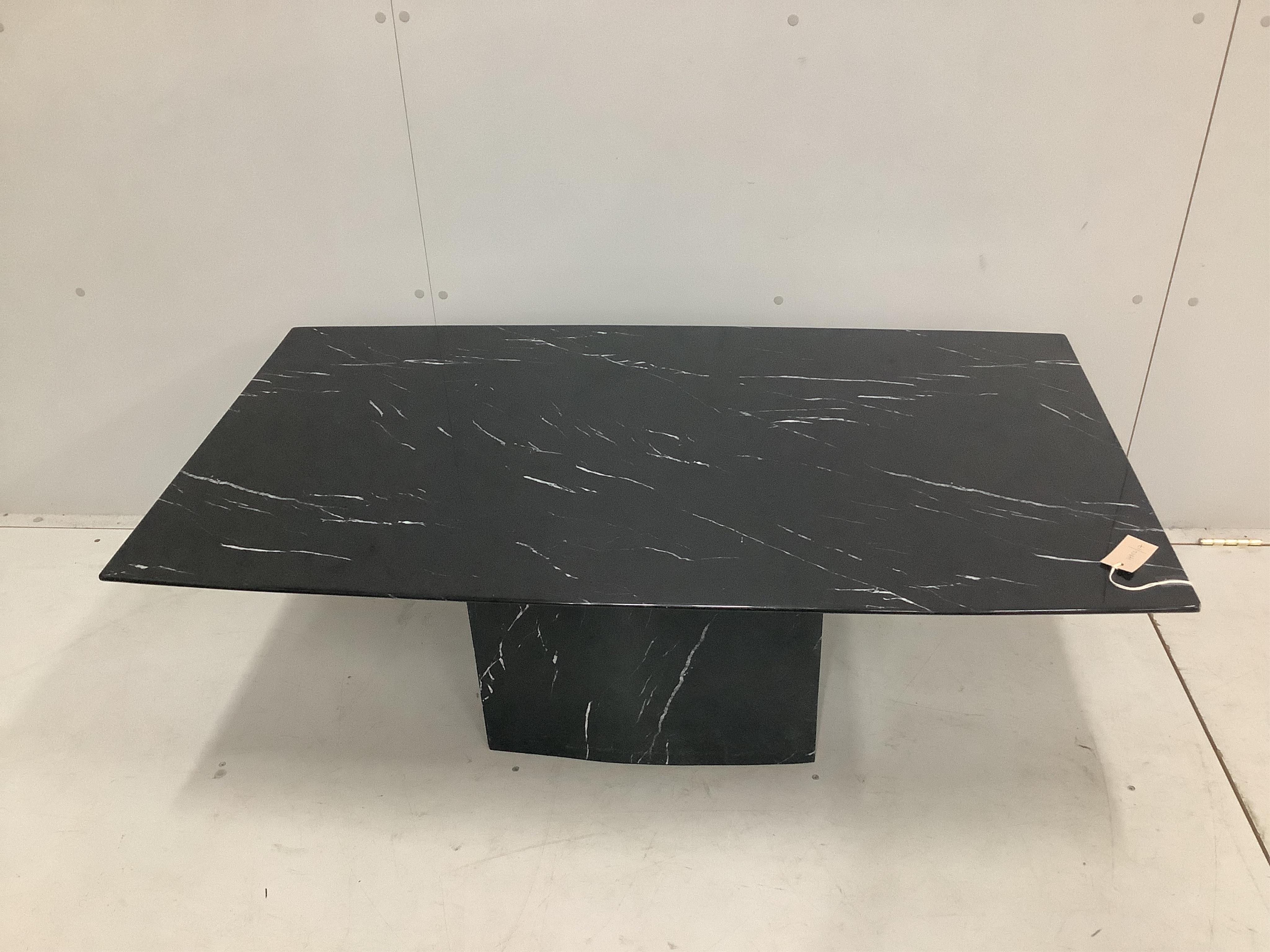 An Italian reconstituted marble coffee table, width 120cm, 68cm, height 47cm. Condition - good